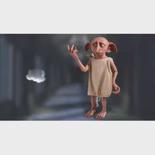 Load and play video in Gallery viewer, The Ashton-Drake Galleries Dobby The House Elf from Harry Potter™ Creatures Portrait Figure Collection Poseable with Sock Handcrafted in Hand-painted Vinyl Sculpted by Ina Volprich 18-inches
