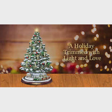 Load and play video in Gallery viewer, The Bradford Exchange Thomas Kinkade The Heart of Christmas Tree Handcrafted Holiday Decor with Illuminated LED Candles Sculpted Village Buildings Star Topper and Plays Music with Rotating Train 13&quot;-Inches
