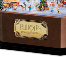 Load image into Gallery viewer, The Bradford Exchange Rudolph The Red-Nosed Reindeer Music Box with Art and 3D North Pole Scene Inside - RCE Global Solutions
